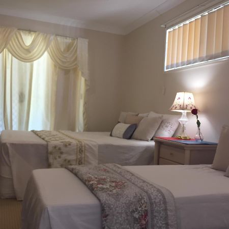 Theme Parks Amituofo Homestay Gold Coast Quarto foto