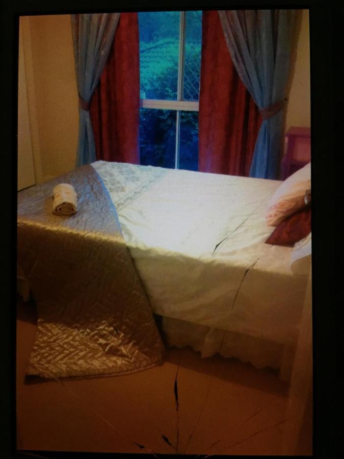 Theme Parks Amituofo Homestay Gold Coast Quarto foto